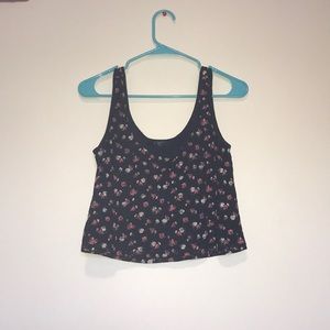 Cute cropped floral tank top.